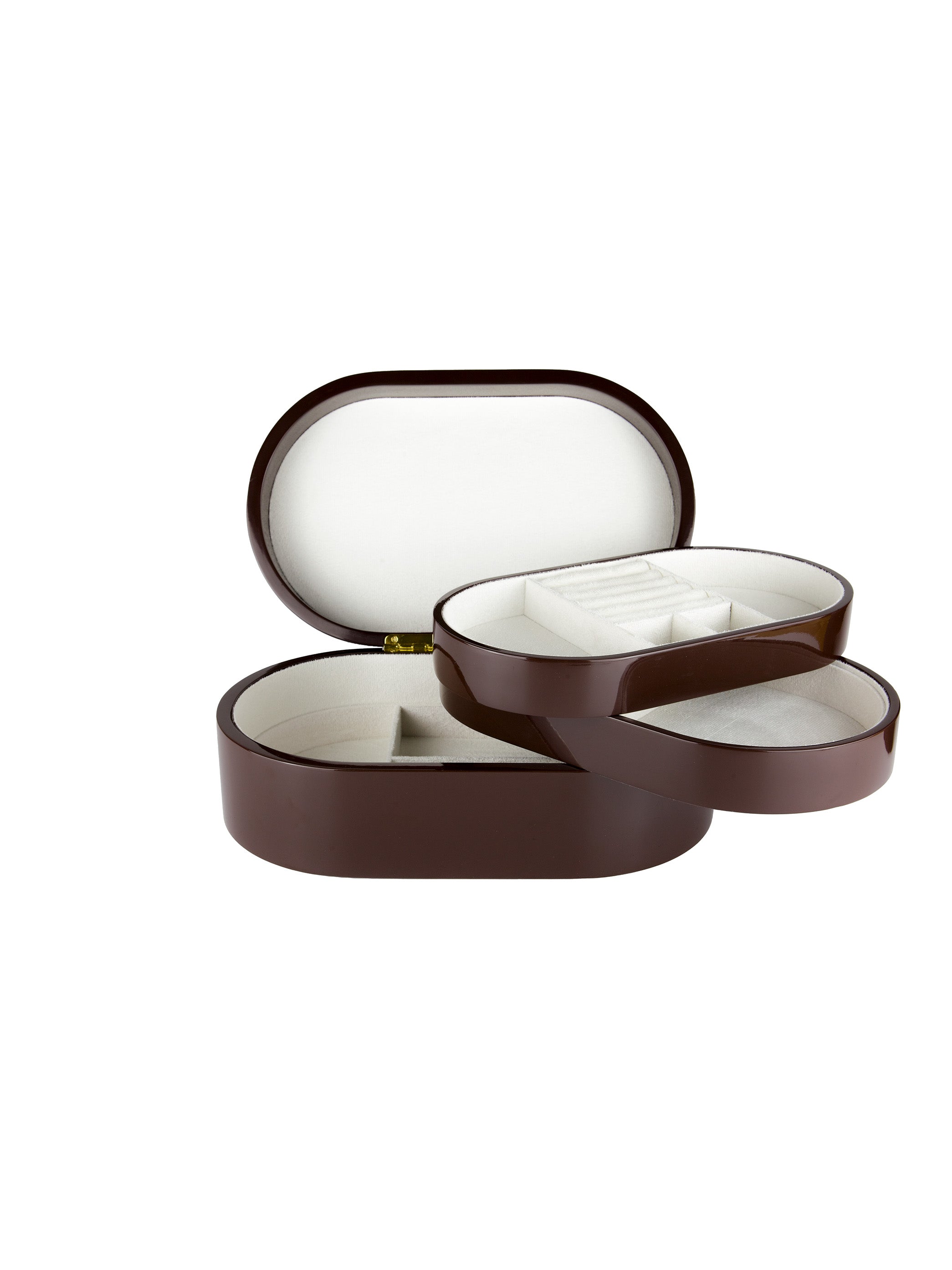 Brunt smyckeskrin från misou som är öppet med brickor