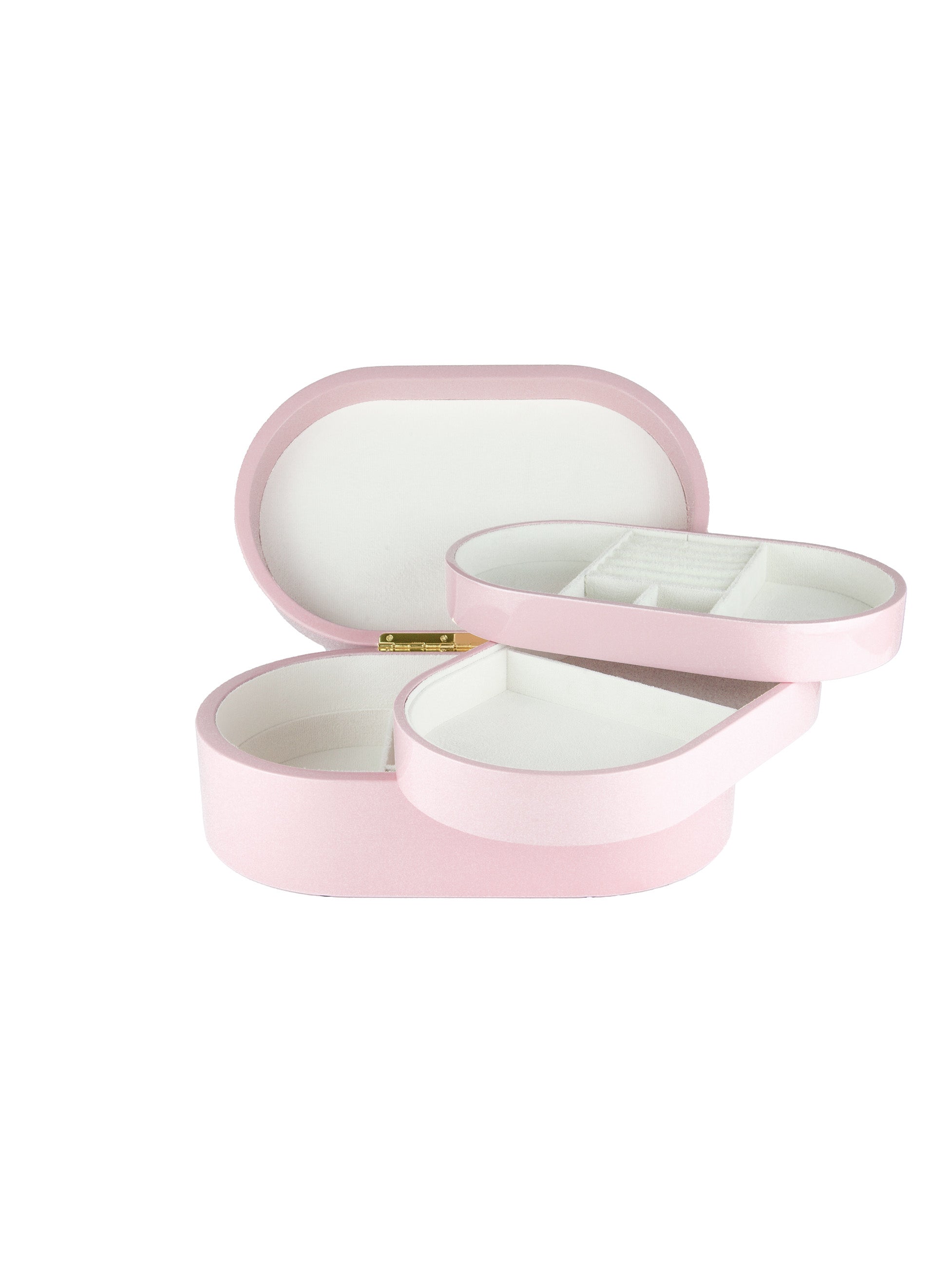 Rosa smyckeskrin från misou som är öppet med brickor